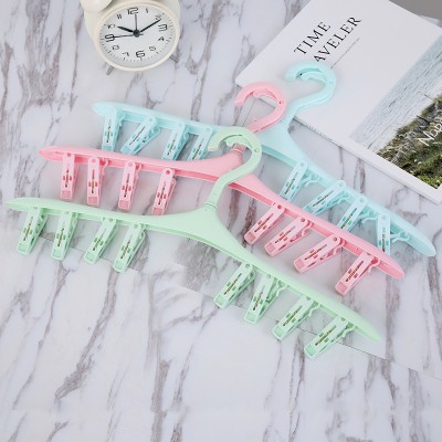 Travelling portable extensible multi-function multipurpose hangers for clothes and socks with clips